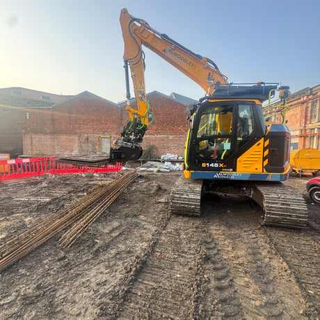10-14 tonne Excavator with Pallet Forks on a construction site